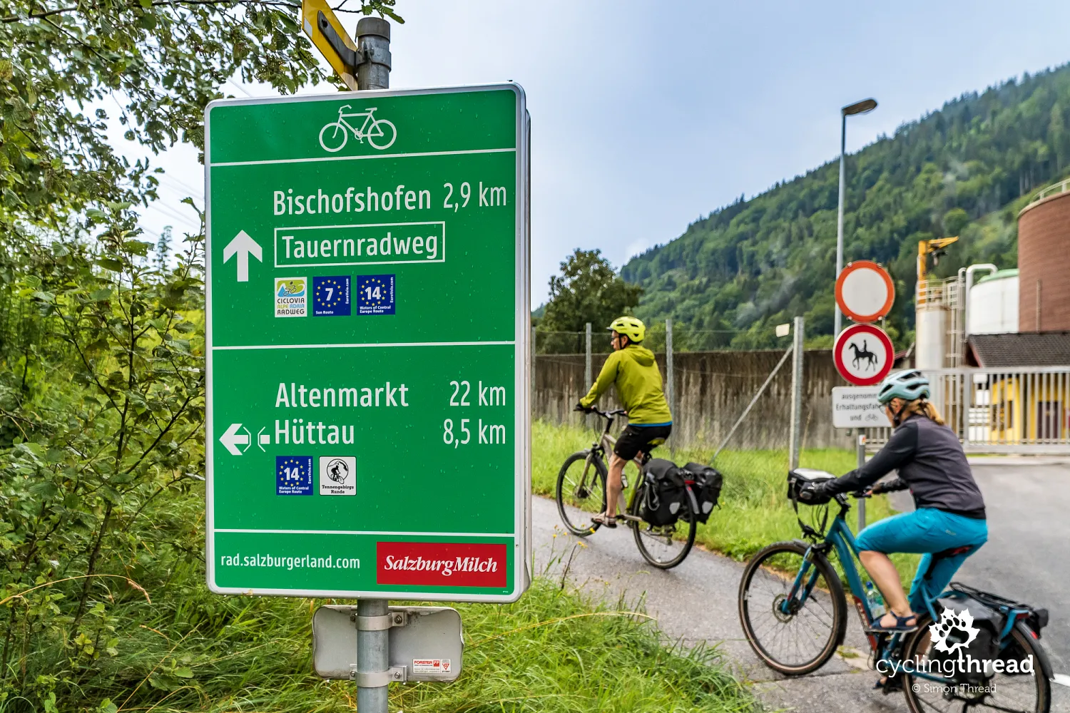 Bike route signposts on the Alpe-Adria route