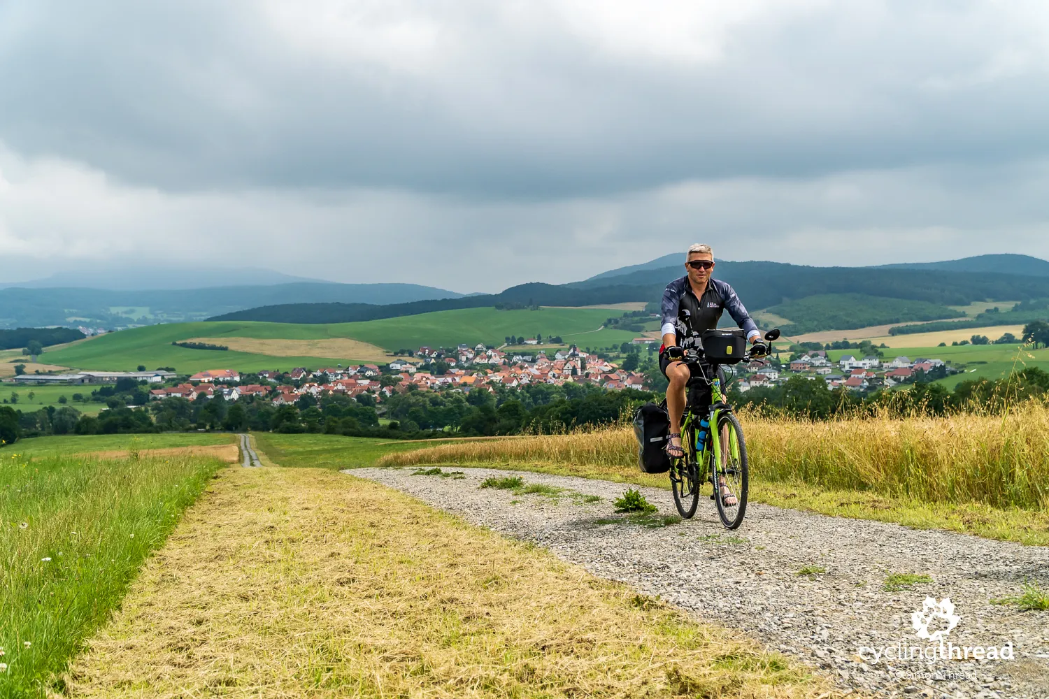 Climbing EuroVelo 13, with Borsch in the background