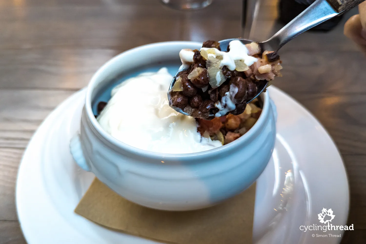 Peas served with smoked bacon and onions