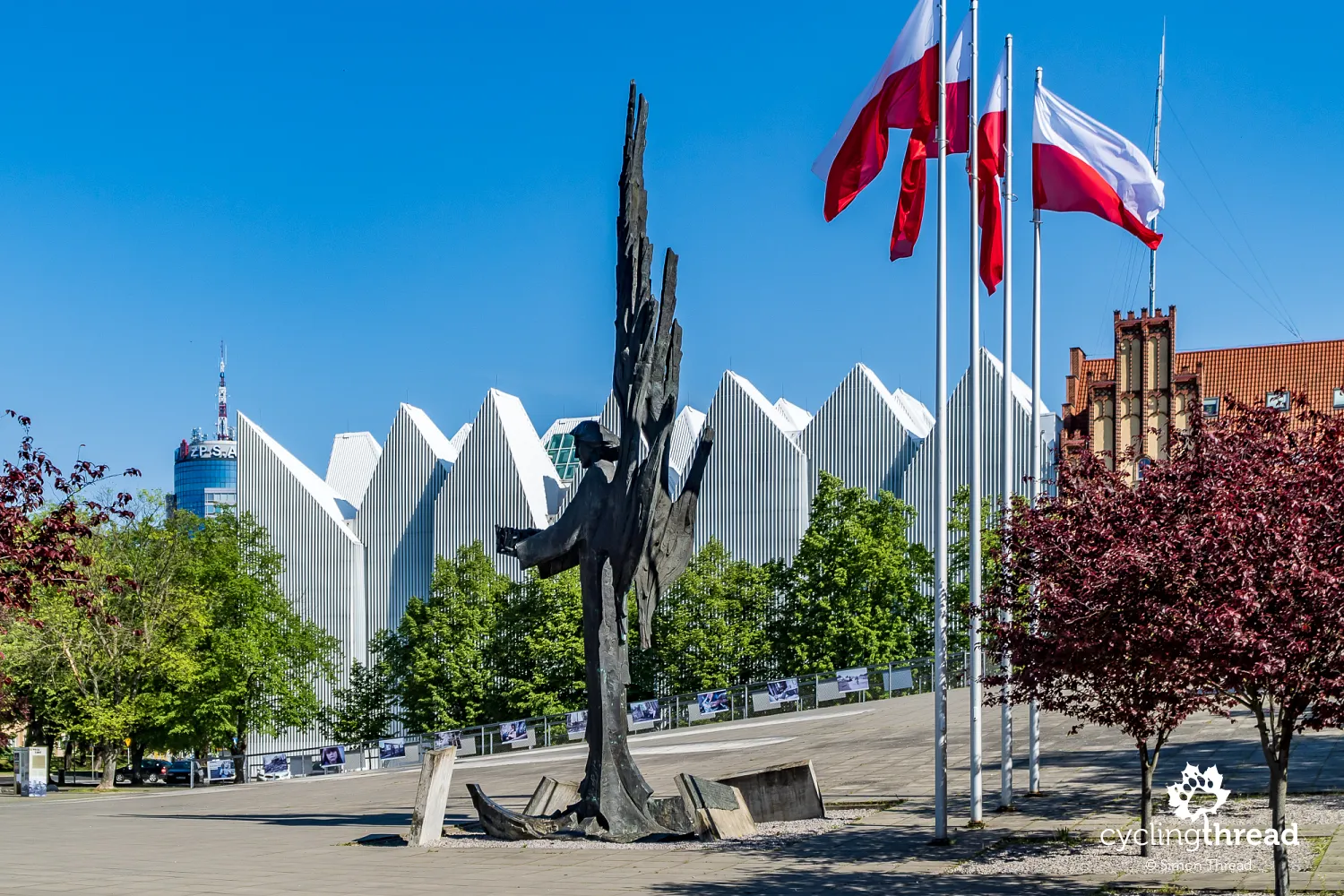 Philharmonic and Monument to the Victims of December 1970