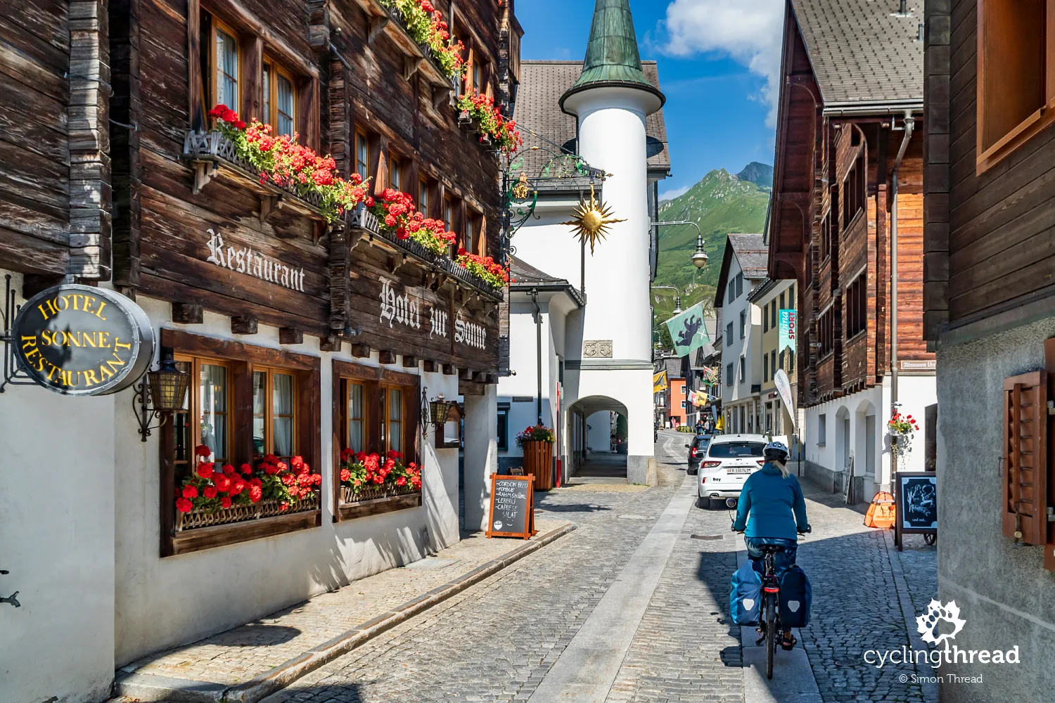 Riding through the streets of Andermatt in Switzerland